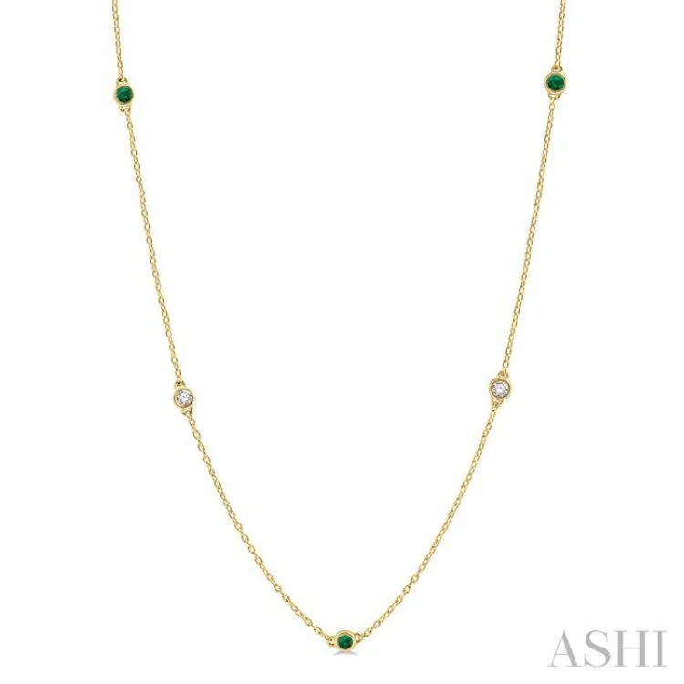 3/8 ctw Round Cut Diamond and 2.6MM Emerald Precious Station Necklace in 14K Yellow Gold