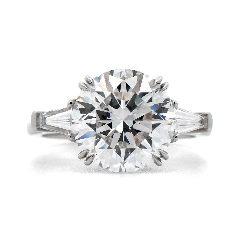 Platinum 3 Stone Round and Baguette Diamond Engagement Ring