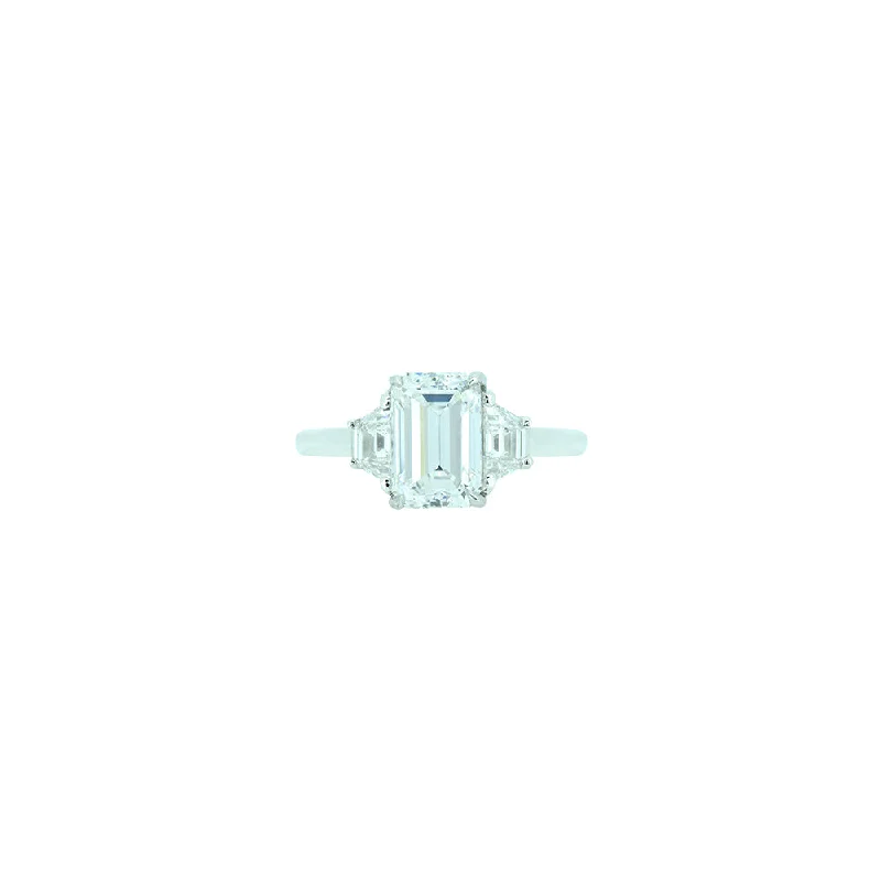 18 Karat White Gold 3 Stone Ring with GIA Emerald Cut Diamond and Side Trapezoid Diamonds