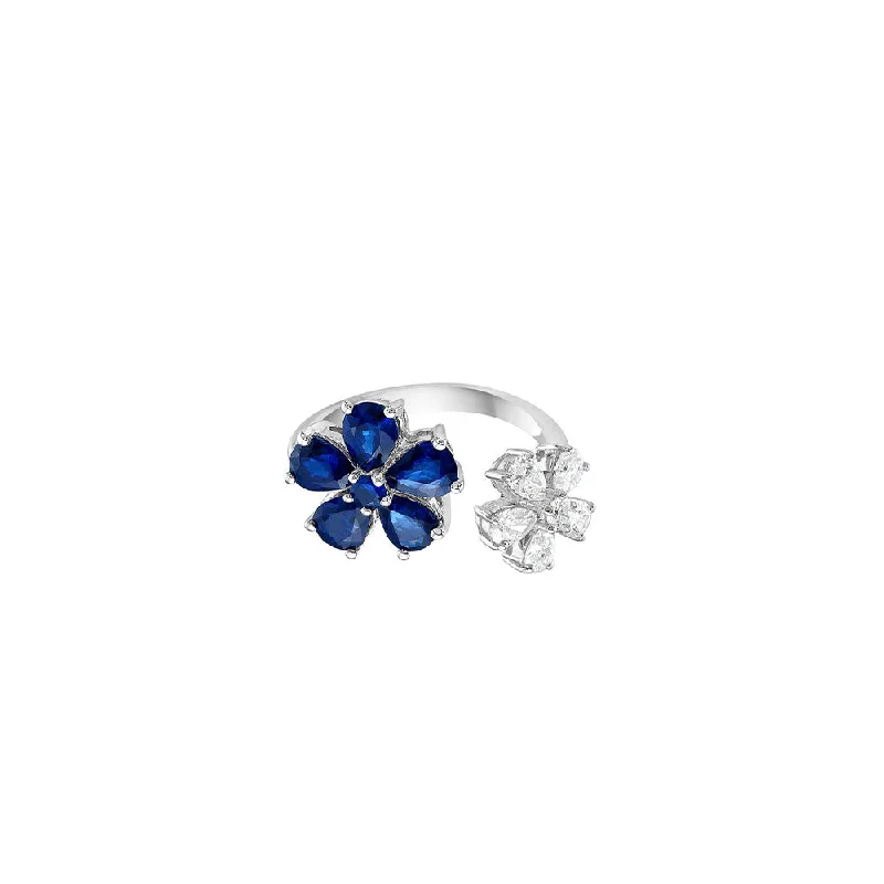 18 Karat White Gold open ring with Sapphire and Diamond flowers