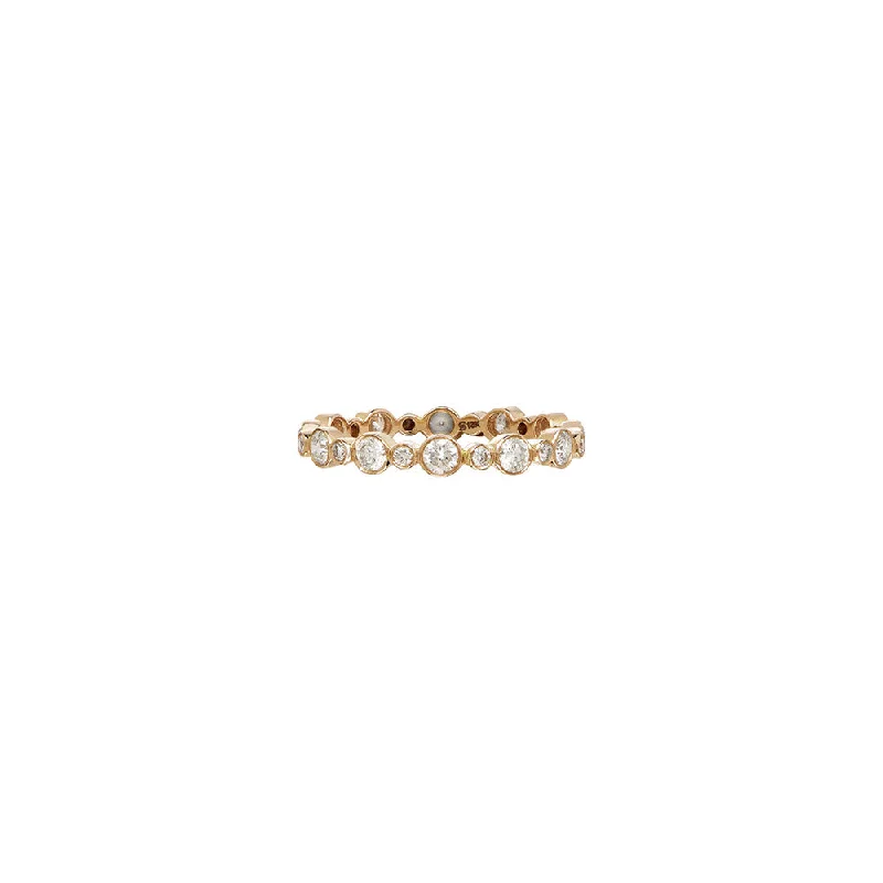 18 Karat Yellow Gold Aurelia ring with Round Bezel set Diamonds