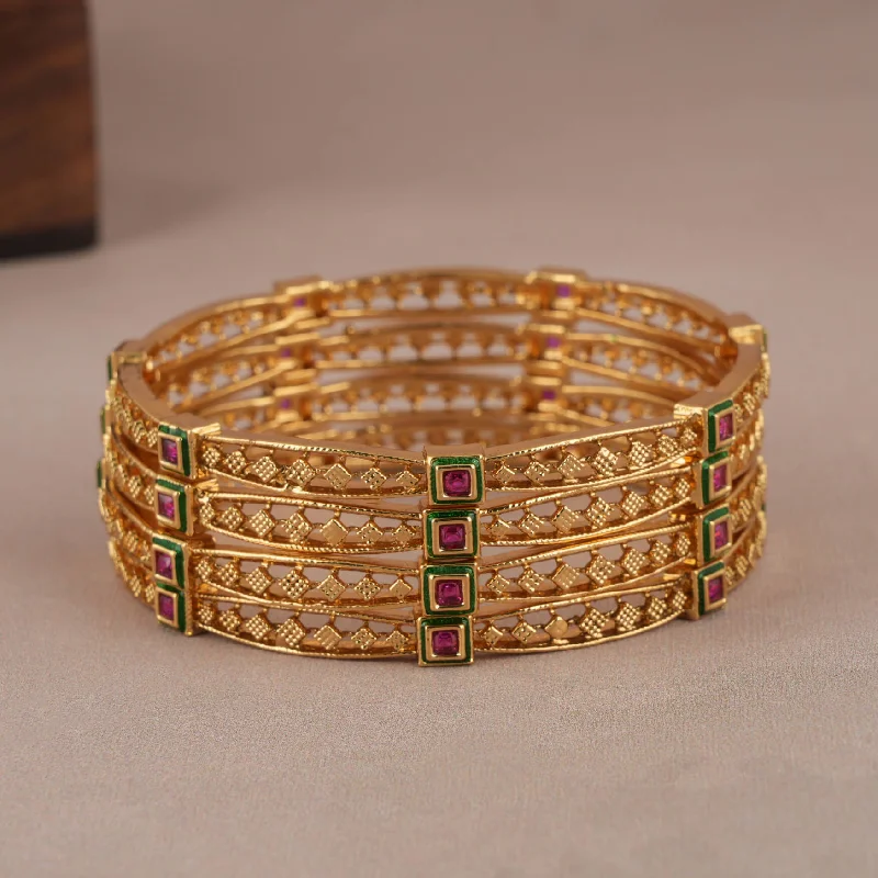 Beautiful stone studded gold plated bangle set (set of 4)